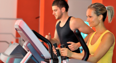 two people working out in the gym