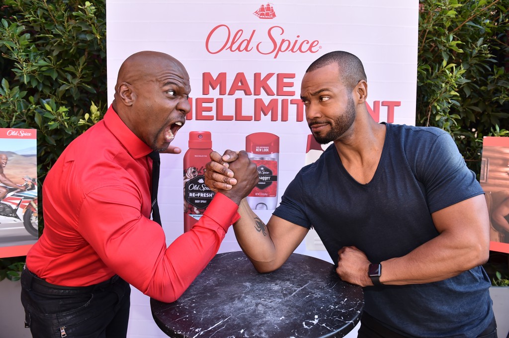 Old Spice Guys Terry Crews, left, and Isaiah Mustafa, team up for the first time ever to celebrate their popular Make a Smellmitment campaign to teach guys that whatever their scent choice, Old Spice has them covered, and announce next Tuesdays much-anticipated conclusion to the campaign, on Wednesday, November 18, 2015, in Los Angeles. (Photo by Jordan Strauss/Invision for Old Spice/AP Images)